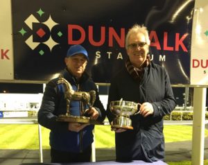 Brendan Powell who represents Joseph O’Brien as Crowne Plaza Dundalk Champion Trainer 2021 accepts the awards from Jim Martin CEO Dundalk Stadium.