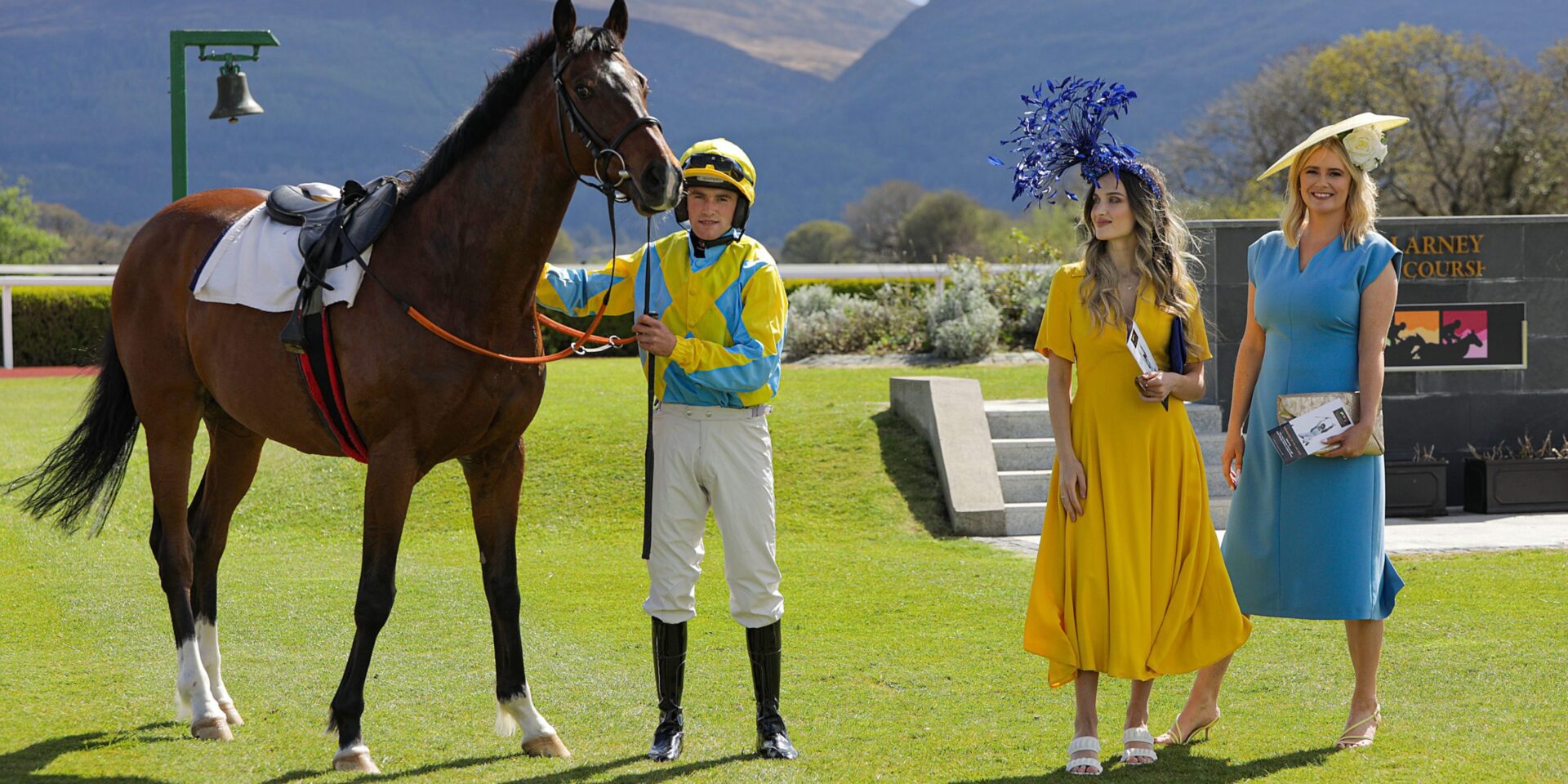 Colours for Ukraine...Mariam Diasamidze, centre, qualified lawyer is known to her social media followers for her natural beauty and flair for fashion. She arrived in killarney from Odessa Ukraine in March, helped launch the Killarney’s 2022 Racing Festivals, at Killarney Race Course, with Aisling O'Sullivan, Jockey, Gary Noonan with race horse ' Landue' . The May Racing Festival begins on Sunday 15th May, Monday 16th and Tuesday 17th May. Photo: Valerie O'Sullivan