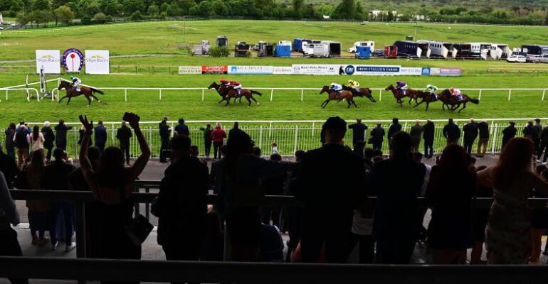 Racegoers cheering home a winner at Sligo