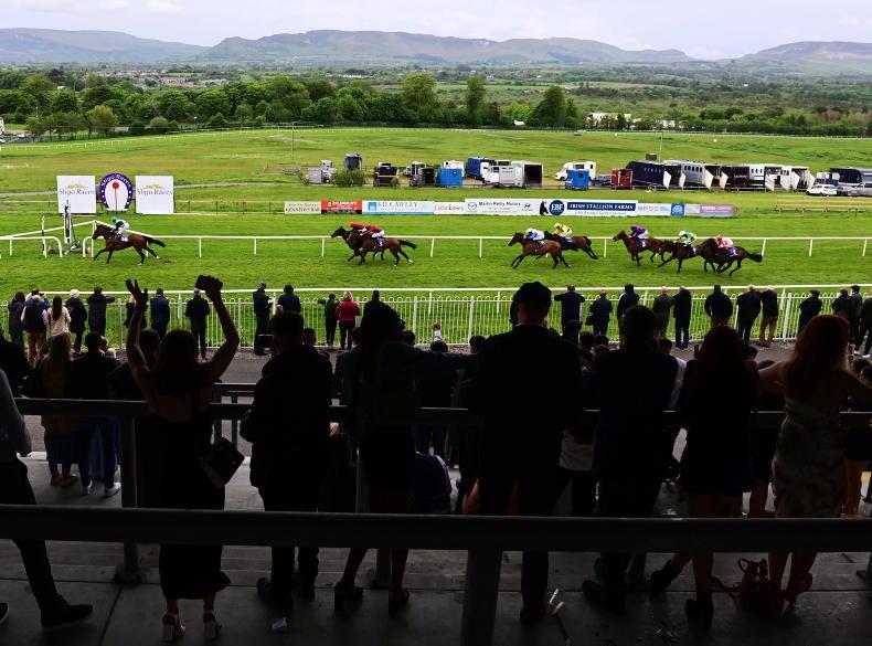 Racegoers cheering home a winner at Sligo