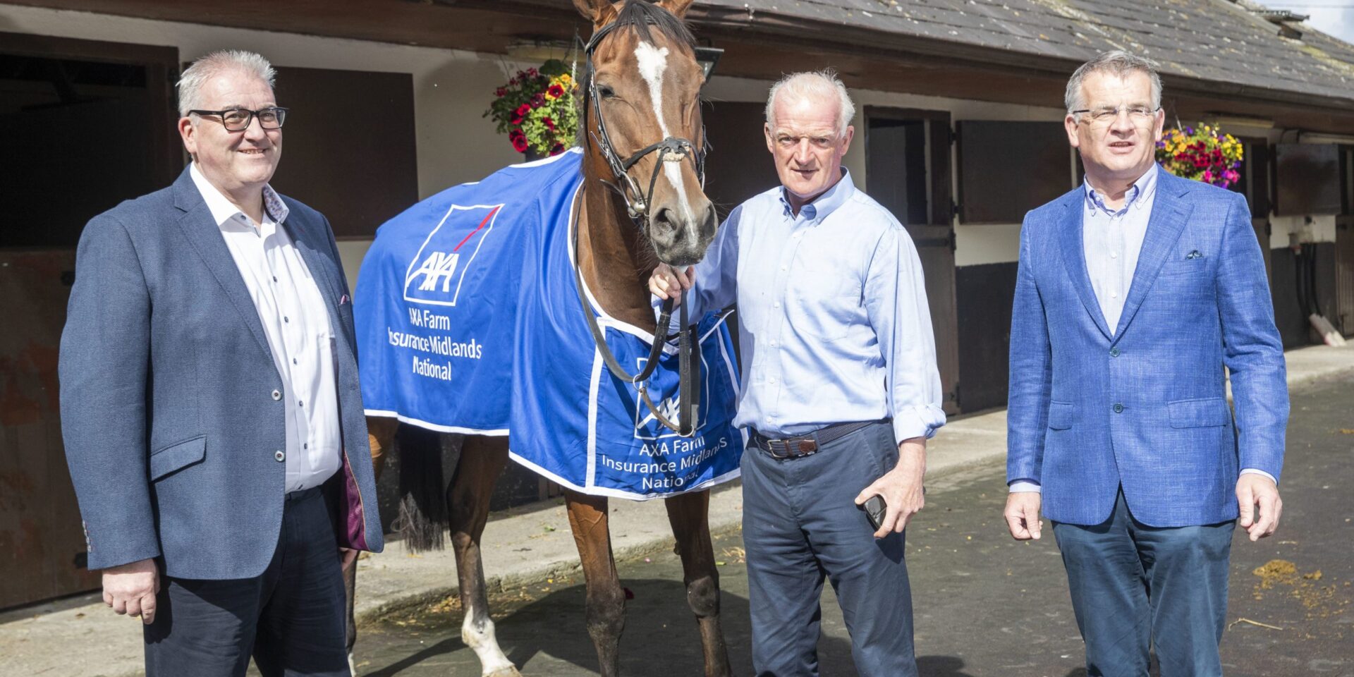 Christy Doherty, AXA head of agriculture, and Paddy Dunican, managing director of Kilbeggan, pictured with champion trainer Willie Mullins and Agusta Gold \ Finbarr O’Rourke